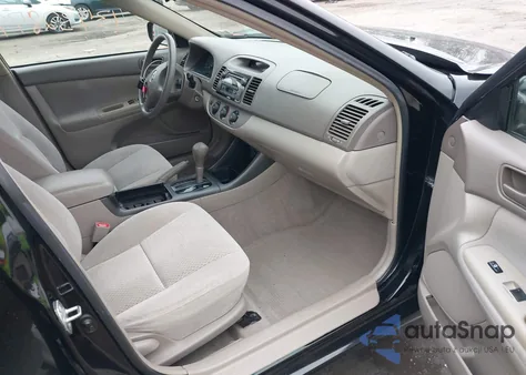 2003 Toyota Camry Le z USA, uszkodzony, nr VIN 4T1BE32K93U237251